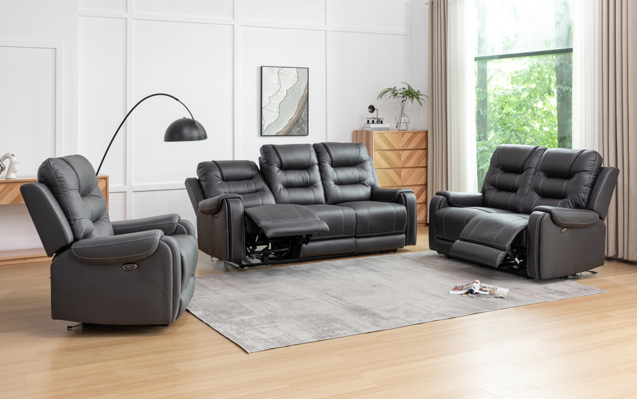 Modern black recliner sofa set in bright living room