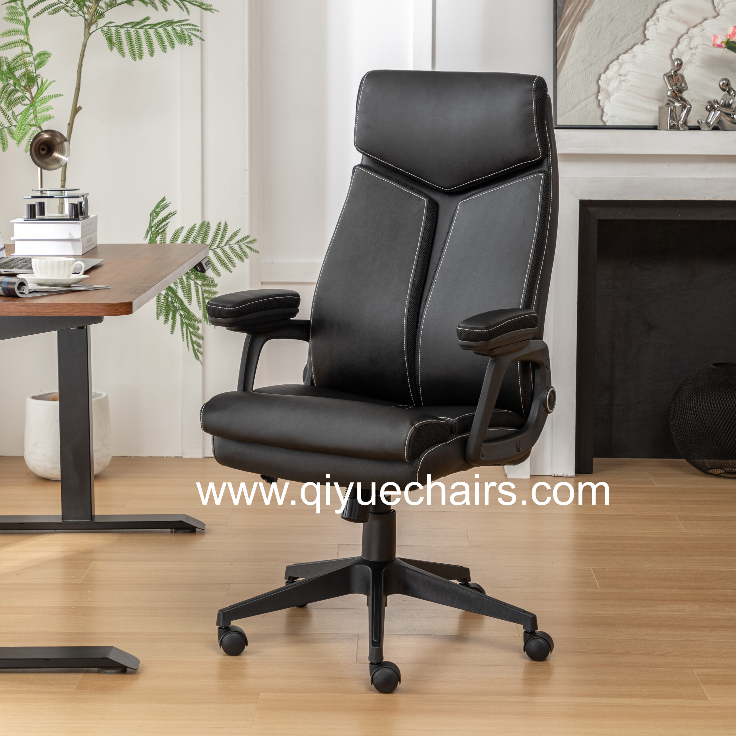 Black leather executive office chair with headrest